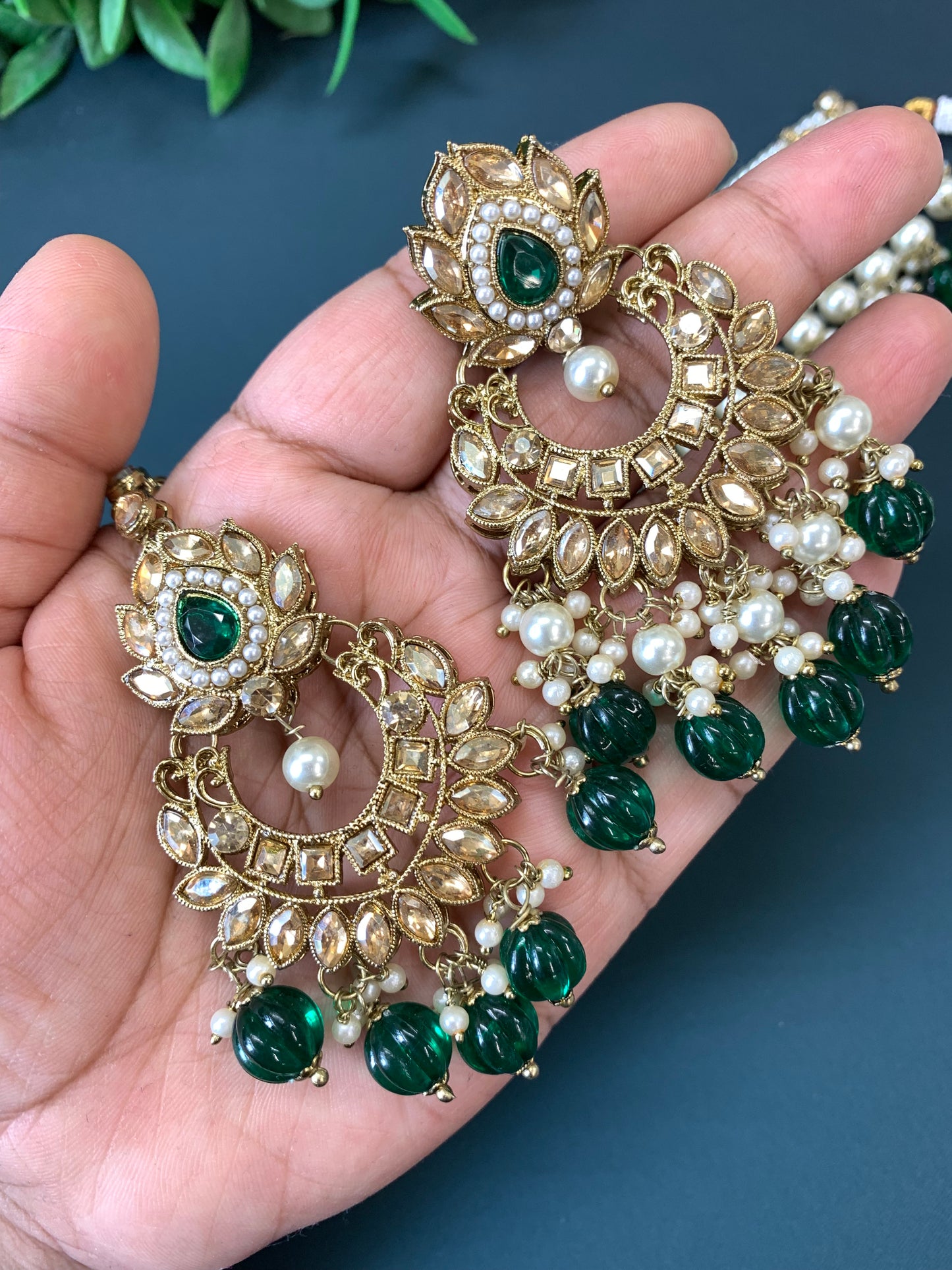 Mahera kundan choker set with matching chandbali and tikka emerald
