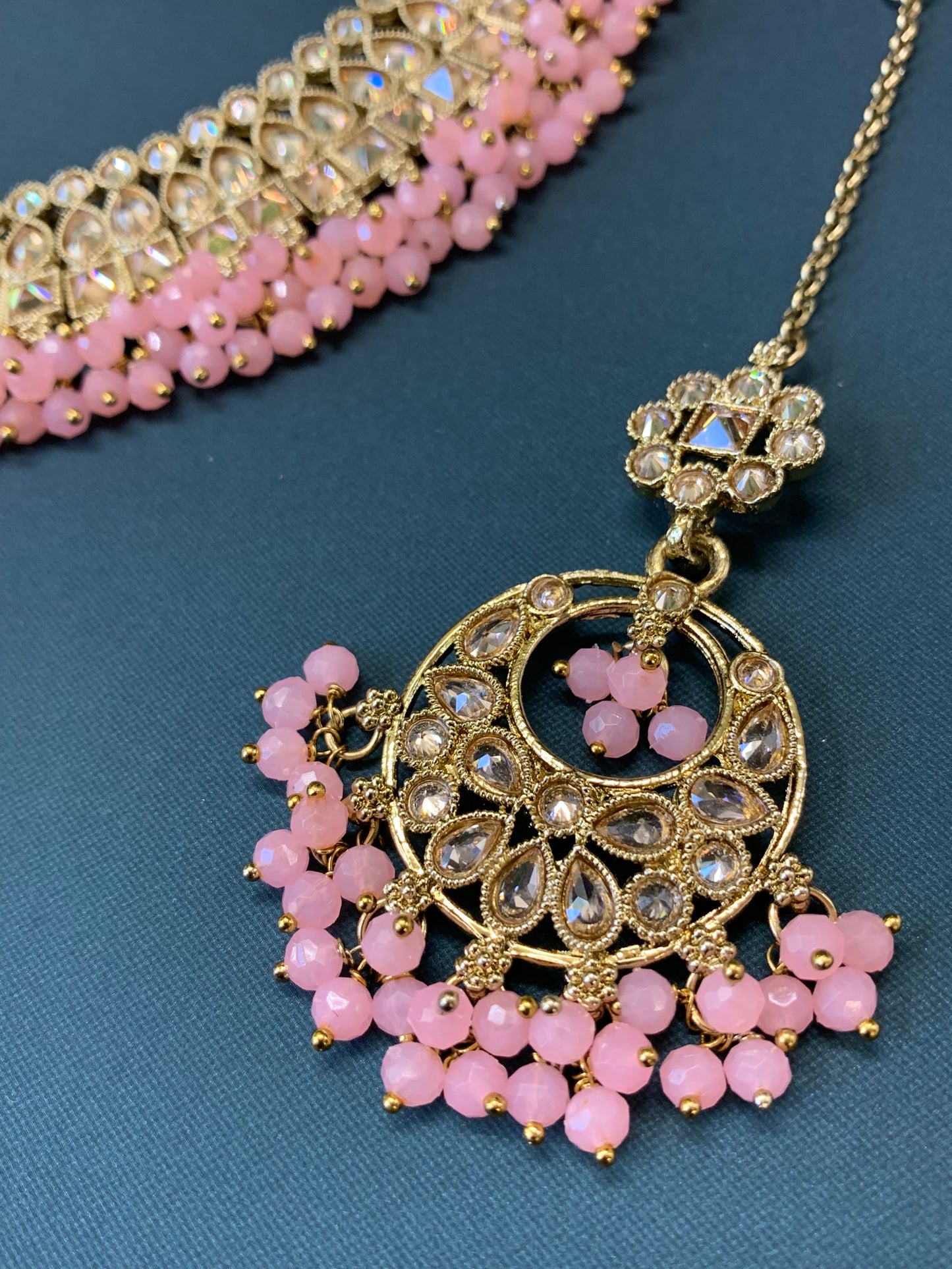 Rashmeet polki necklace with matching earring tikka antique gold pink