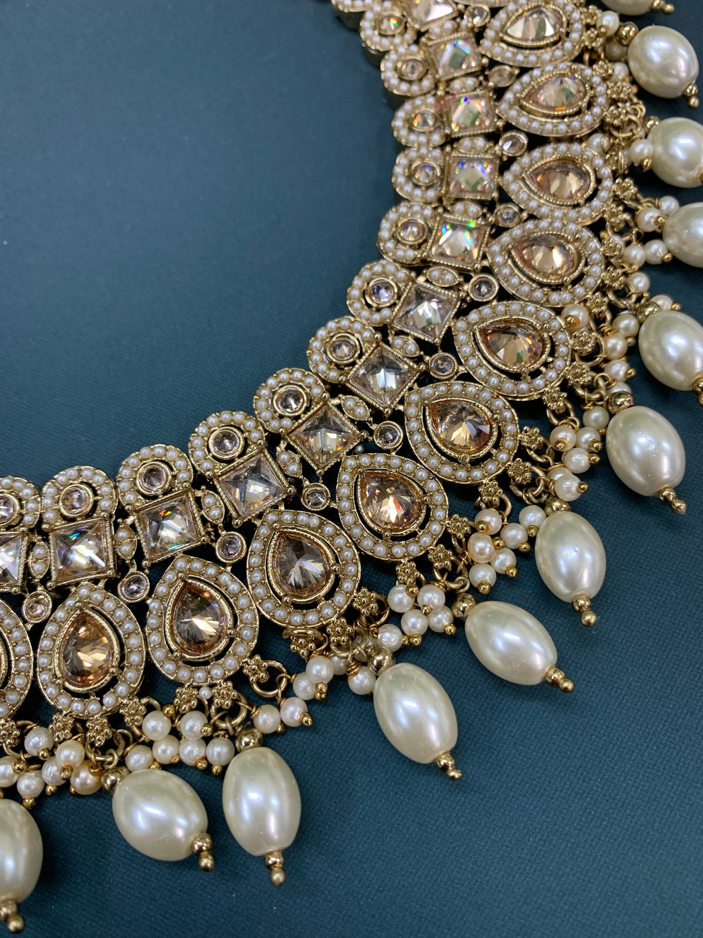 Reagan polki necklace set with matching Chandbali and tikka set gold/white/pearl
