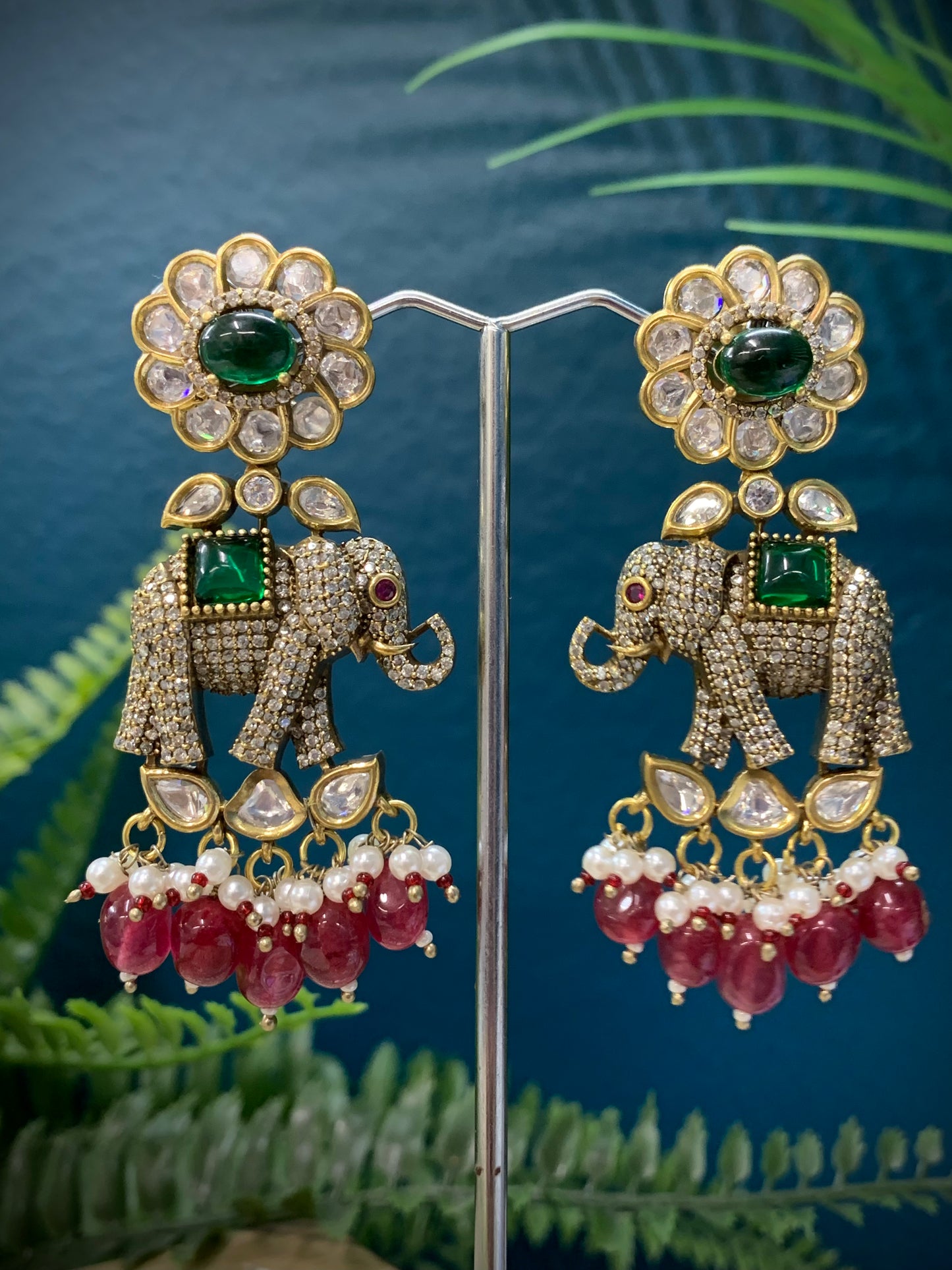Tyaani kundan statement earring earring with pota stone work and American diamond