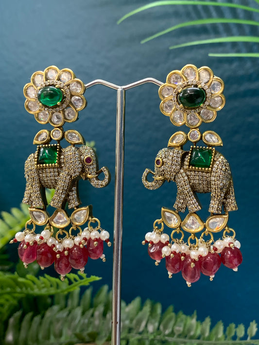 Tyaani kundan statement earring earring with pota stone work and American diamond