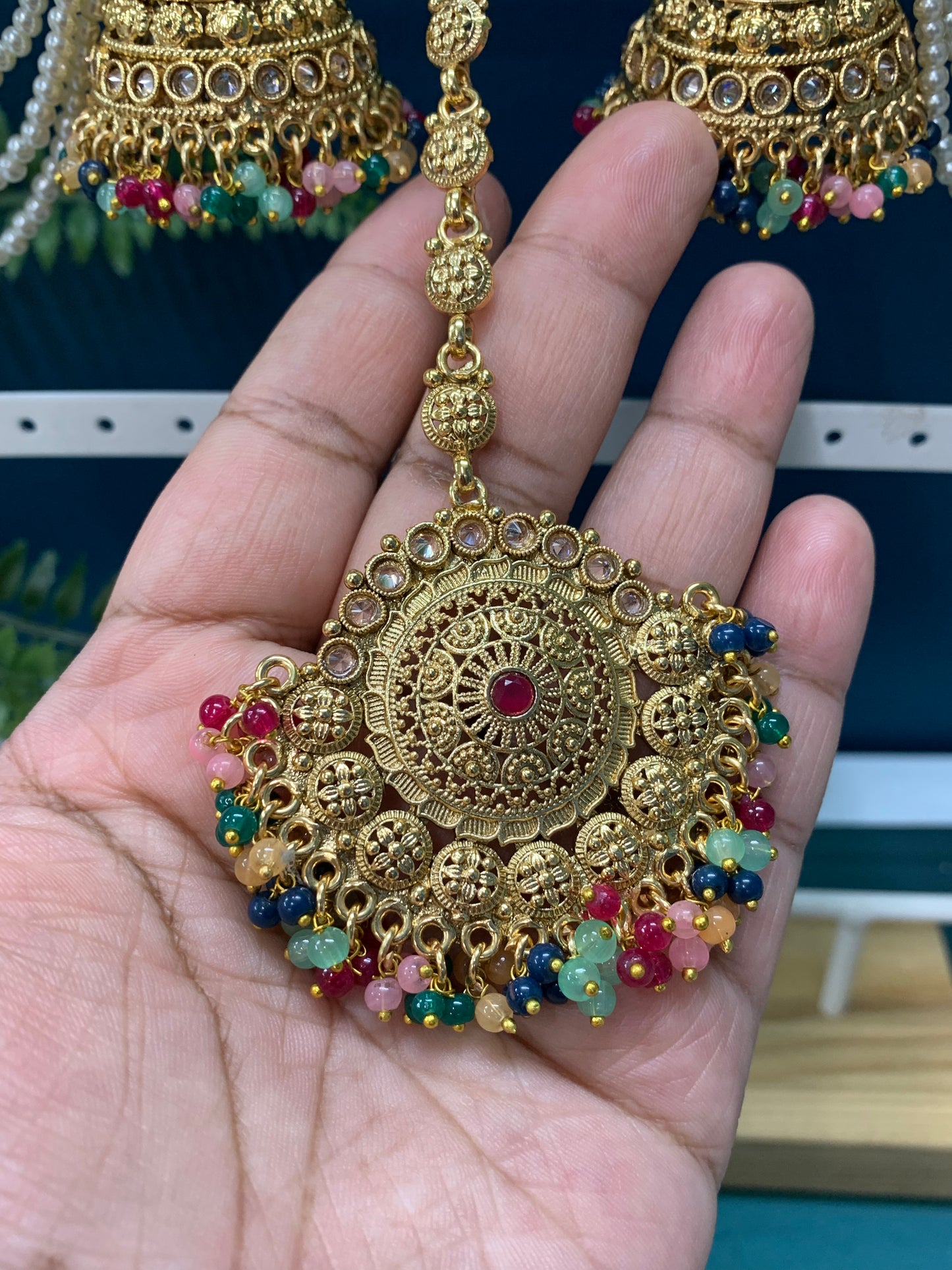 Bahubali style gold multi jhumki tikka with 5 layers of pearl Sahare Harini