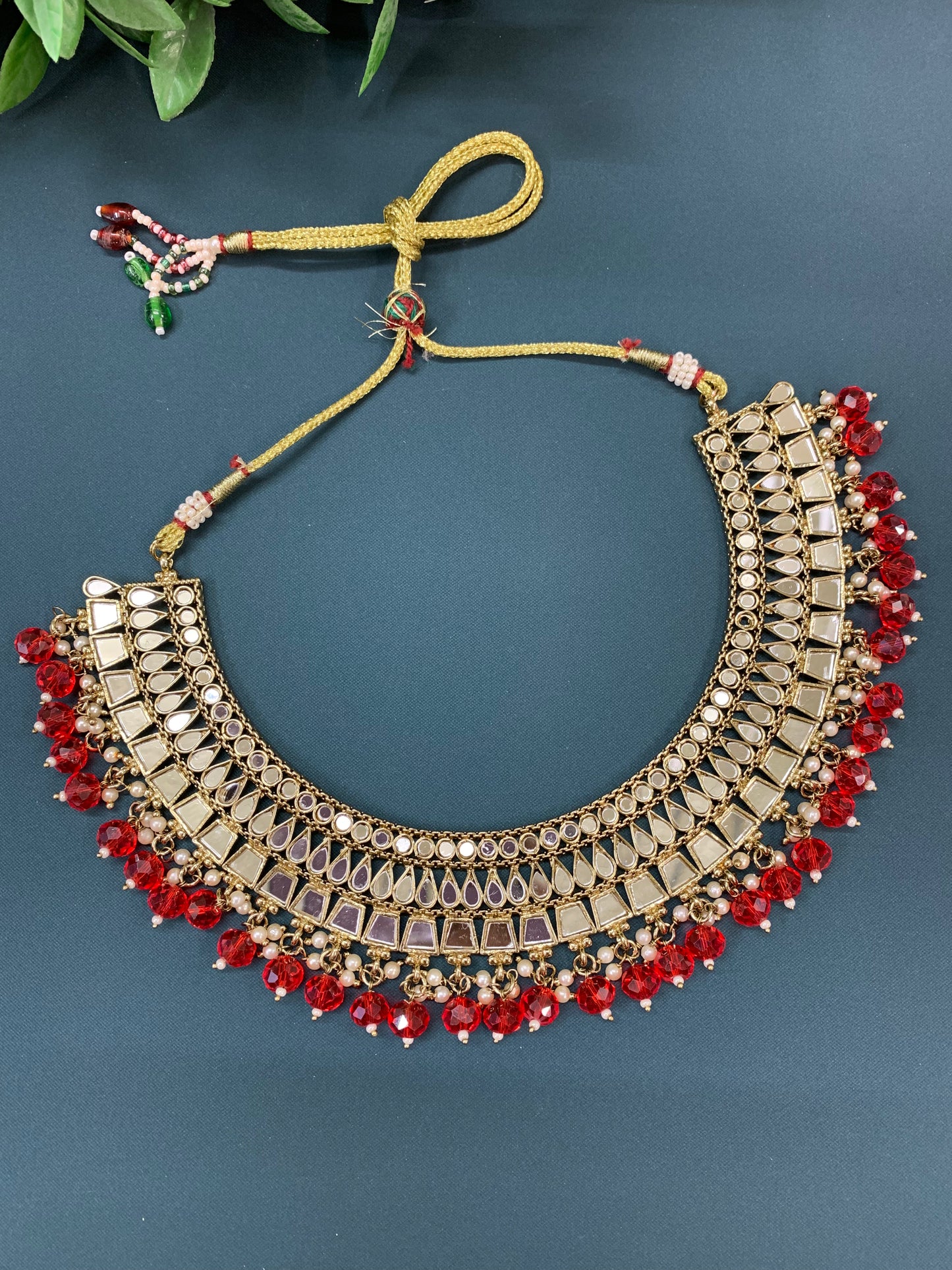 Shreya mirror necklace set with matching Chandbali antique blood red
