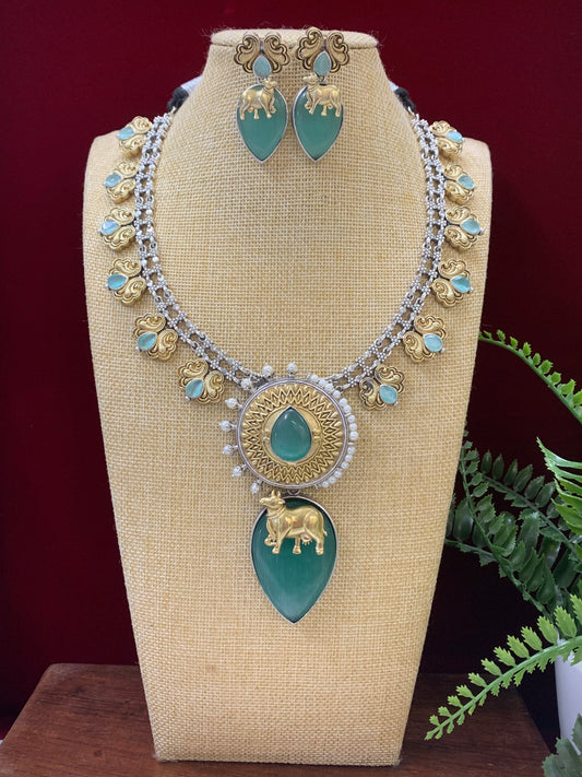 Dual tone German silver replica necklace with earring