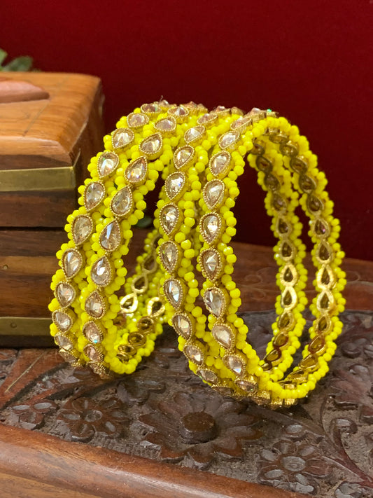 Reverse polki bangle Sonia in antique gold with pastel yellow pearl details