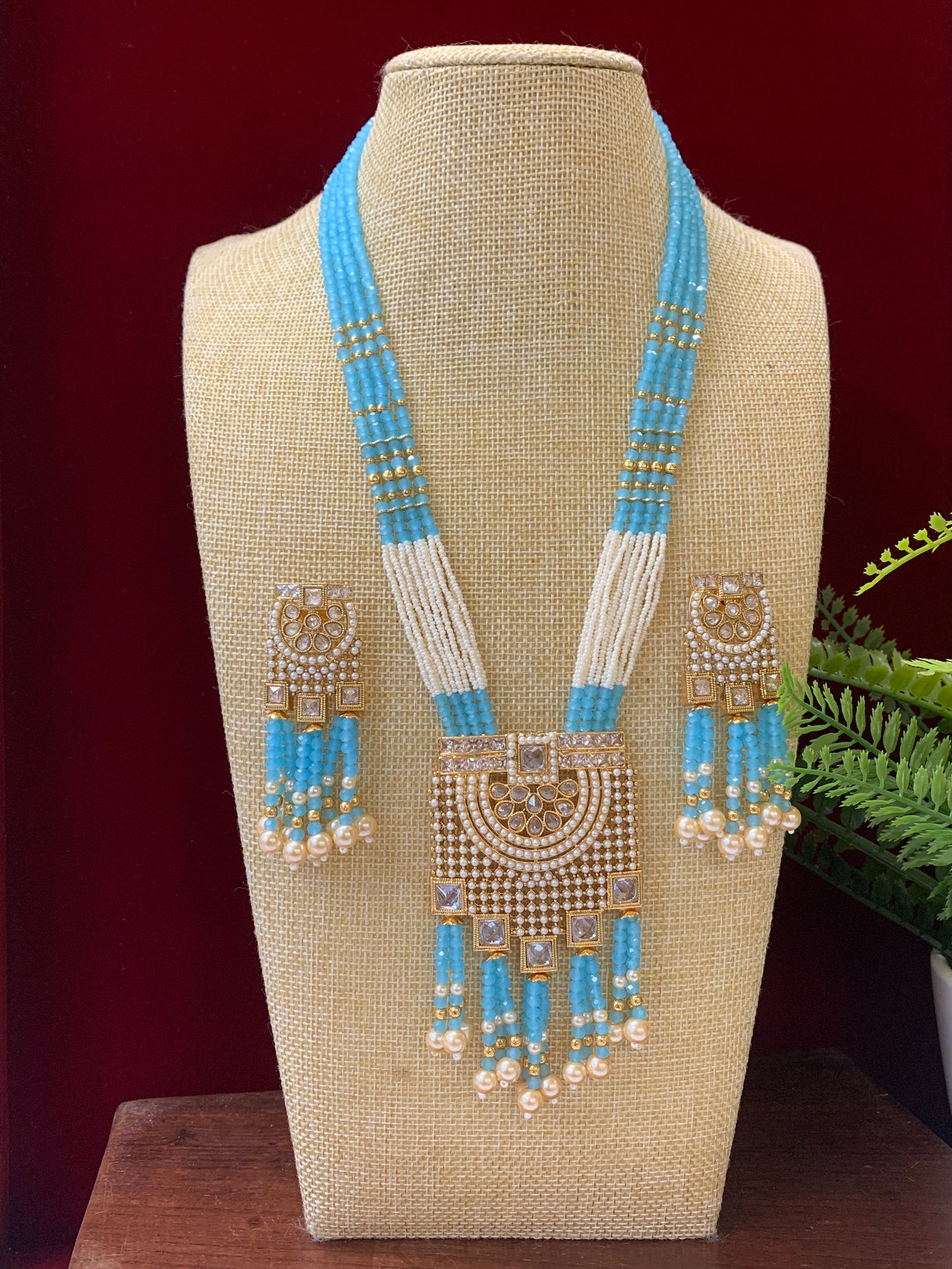 Anika polki long mala set gold polki and baby blue
