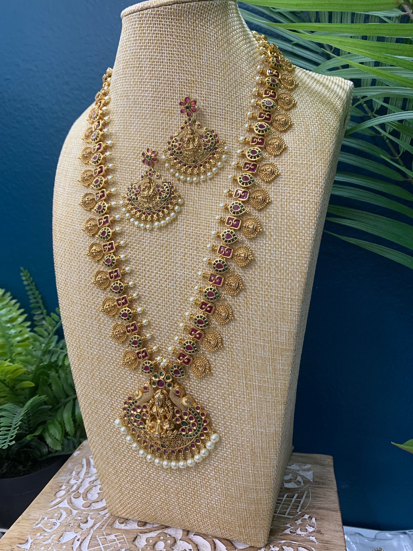 Temple style gold long mala rani haram with matching earring