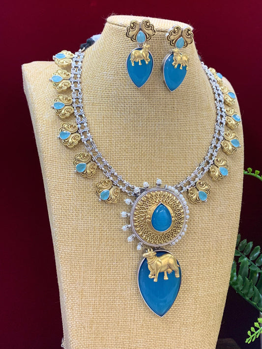 Dual tone German silver replica necklace with earring