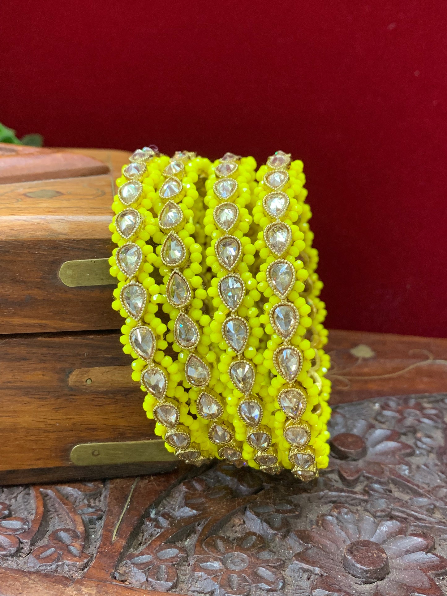 Reverse polki bangle Sonia in antique gold with pastel yellow pearl details