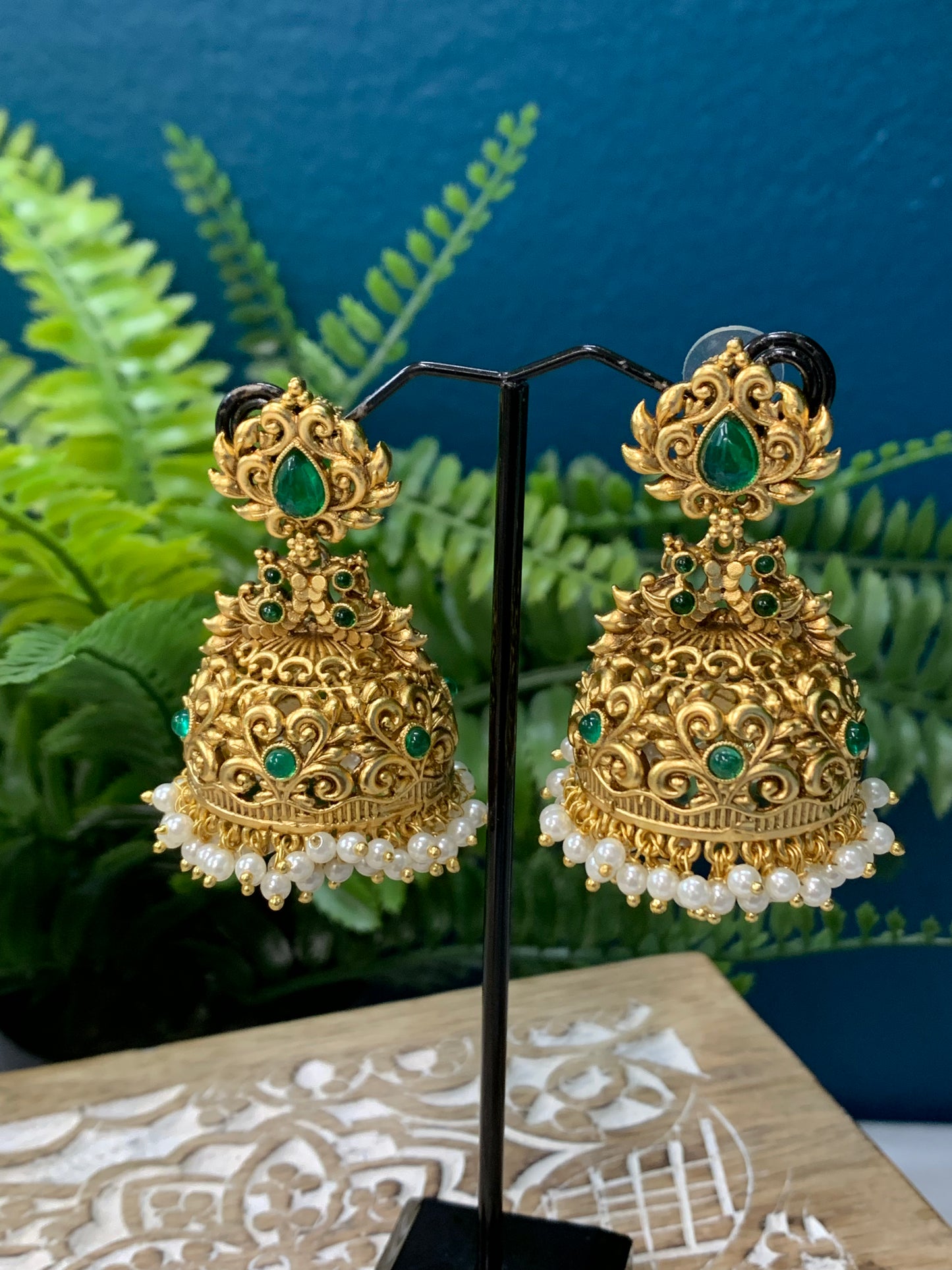 High gold polished jhumki temple style with kemp details