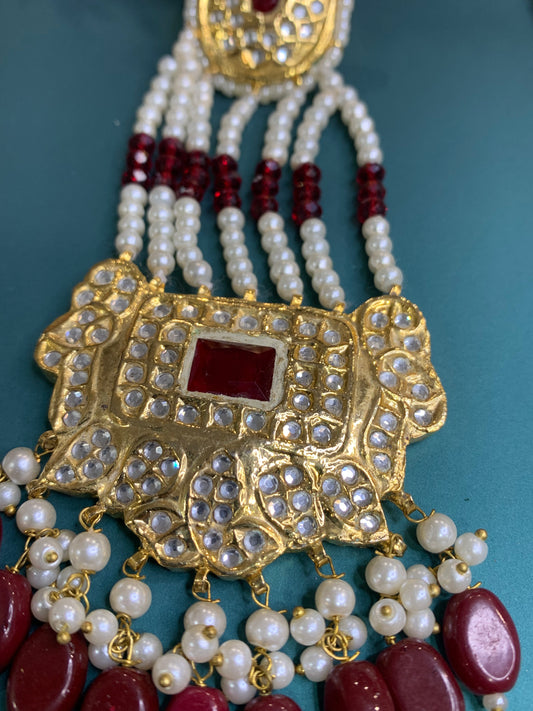 Pakistani multani /thappa kundan earring in maroon.