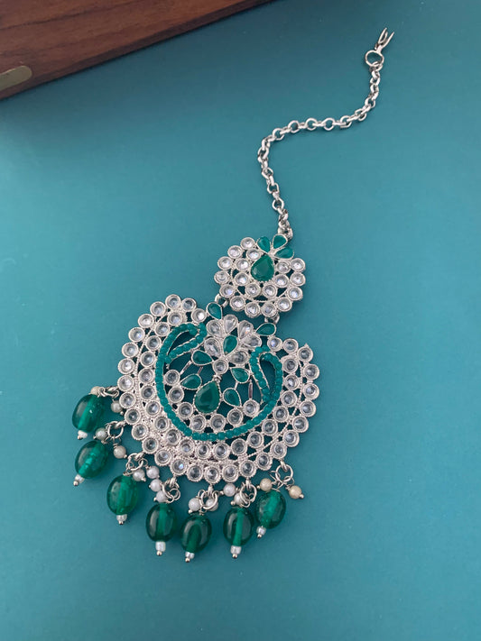 Single medium to big tikka in teal / silver