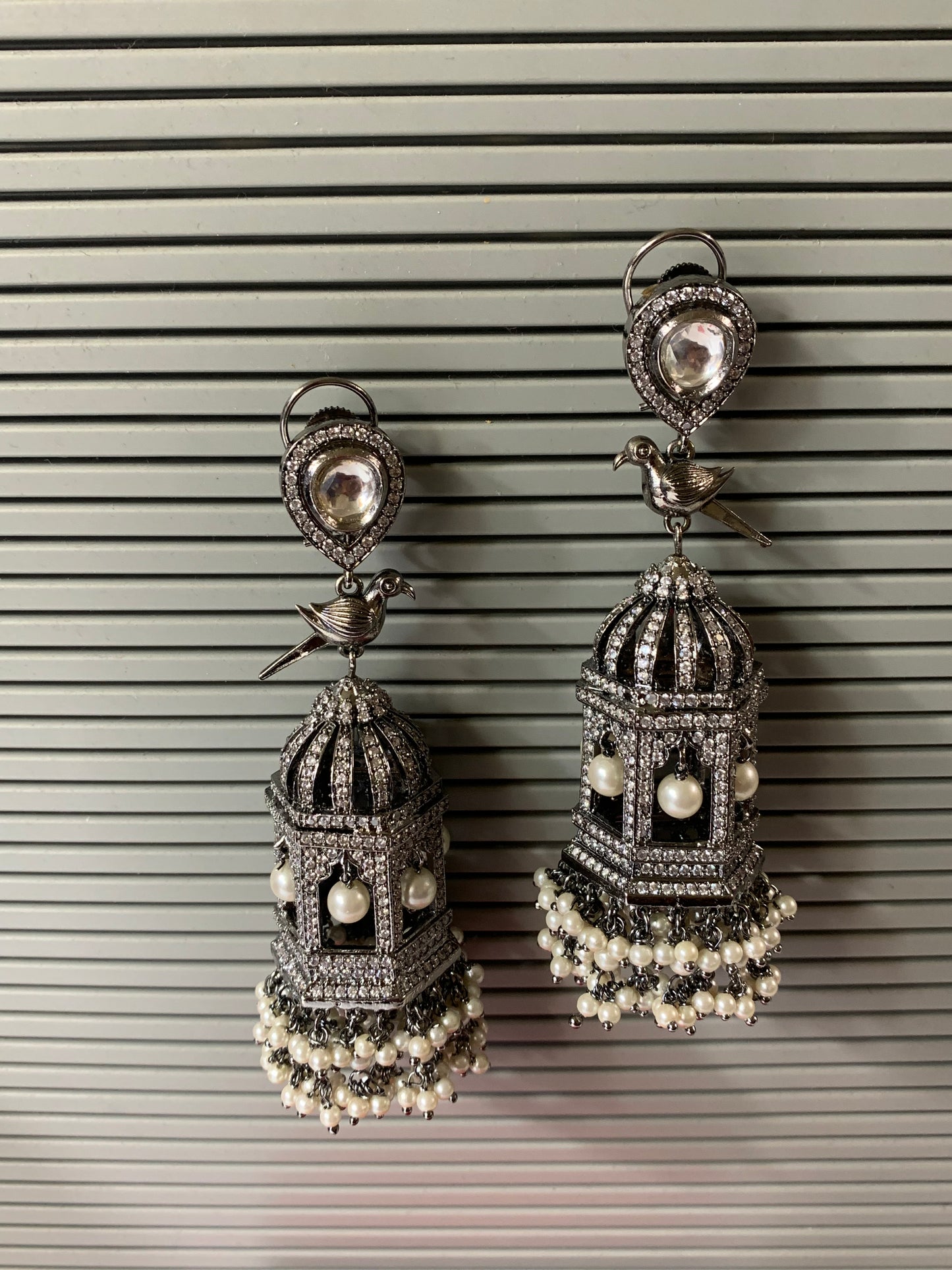 Oversize American diamond birdcage earring with kundan details