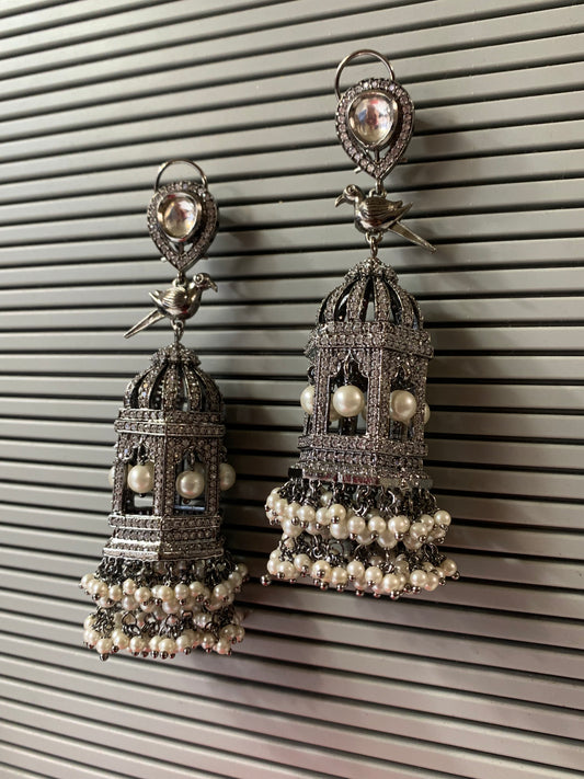 Oversize American diamond birdcage earring with kundan details