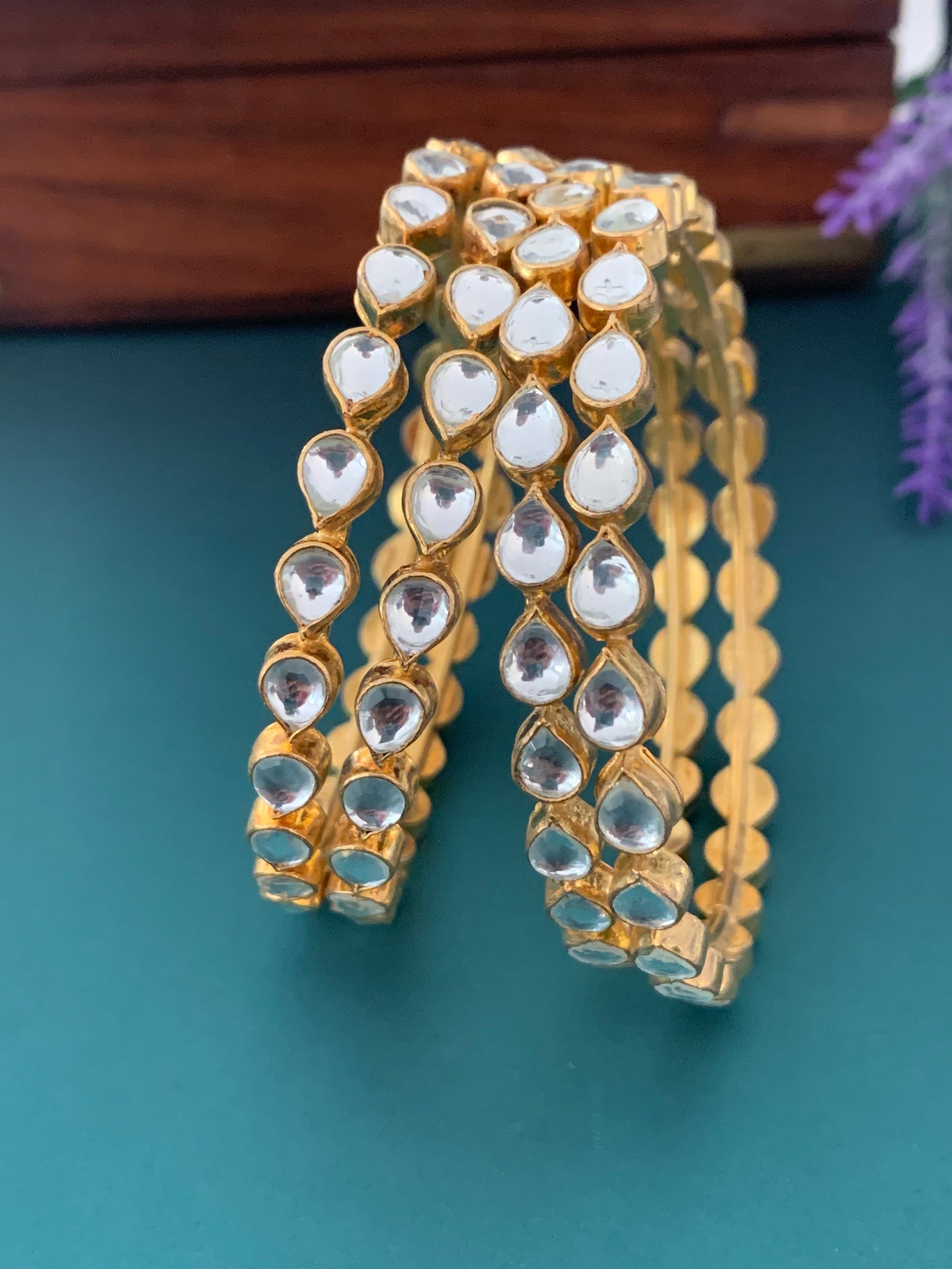 Gold plated pachi kundan bangle comes in a pair