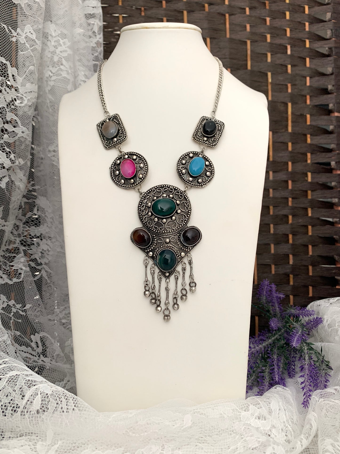 Black metal oxi with natural stone setting