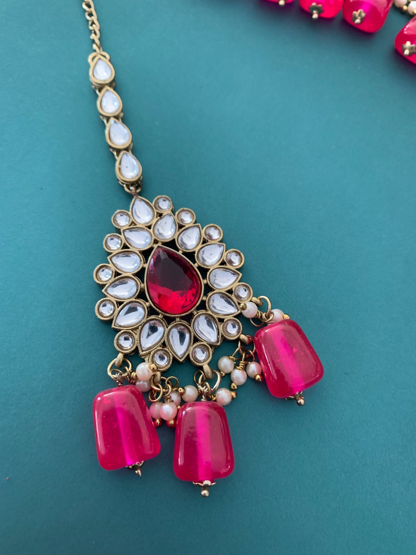Sadiya kundan choker set in magenta pink