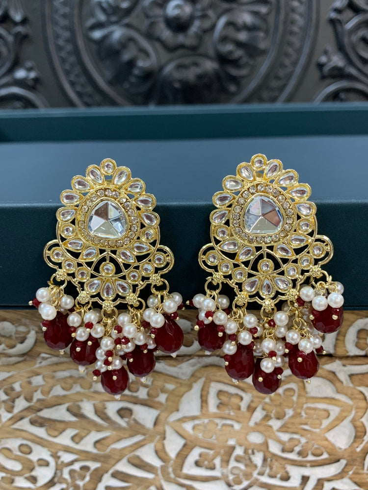 Joel gold kundan stud earring with white pearl and red maroon burgundy crystal