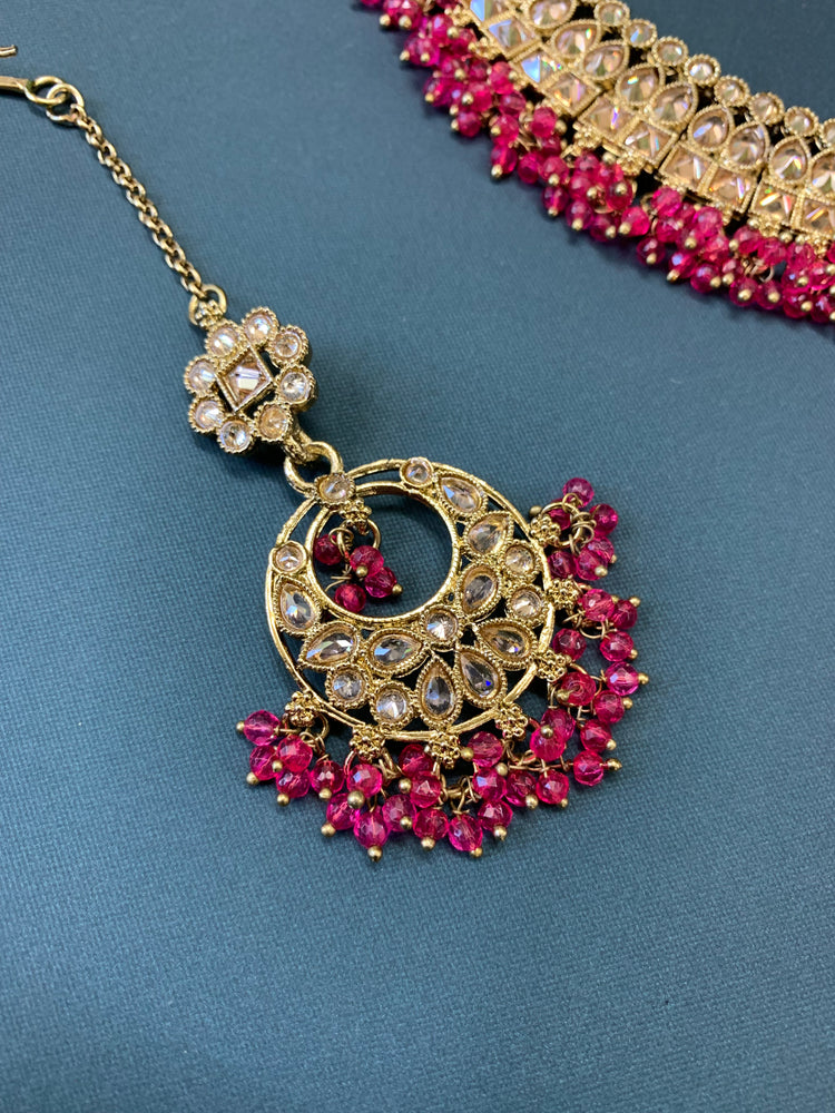 Rashmeet polki necklace with matching earring tikka hot pink magenta