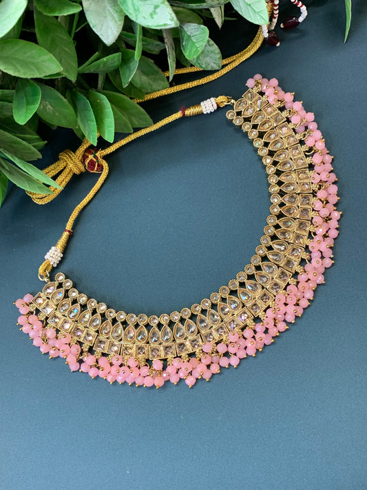 Rashmeet polki necklace with matching earring tikka antique gold pink