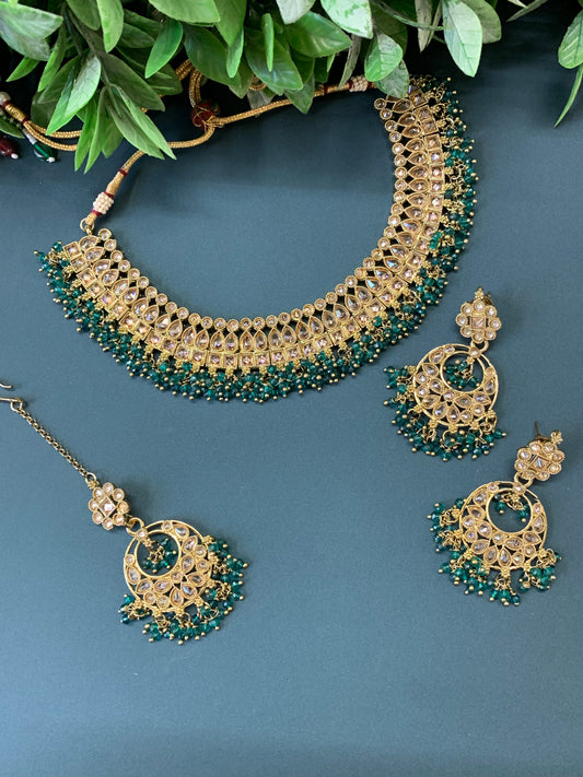 Rashmeet polki necklace with matching earring tikka antique gold teal green