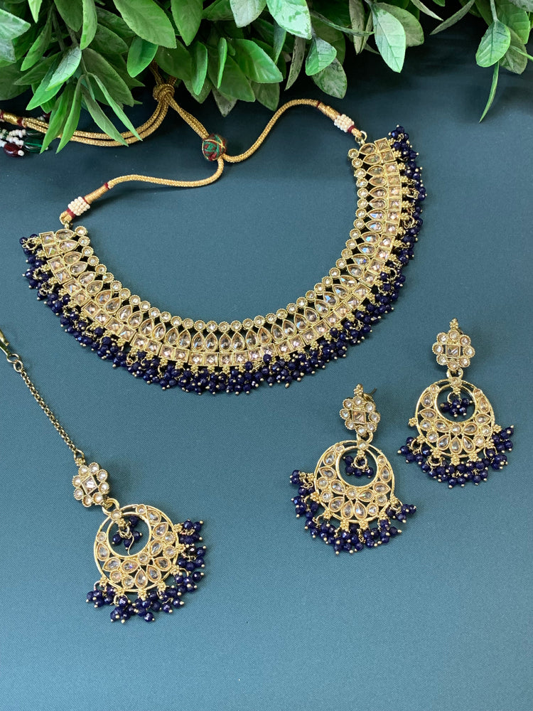 Rashmeet polki necklace with matching earring tikka dark blue