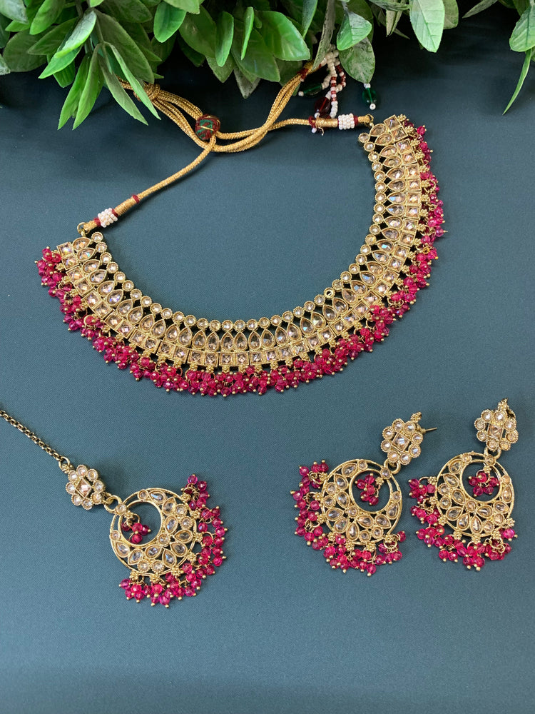 Rashmeet polki necklace with matching earring tikka hot pink magenta