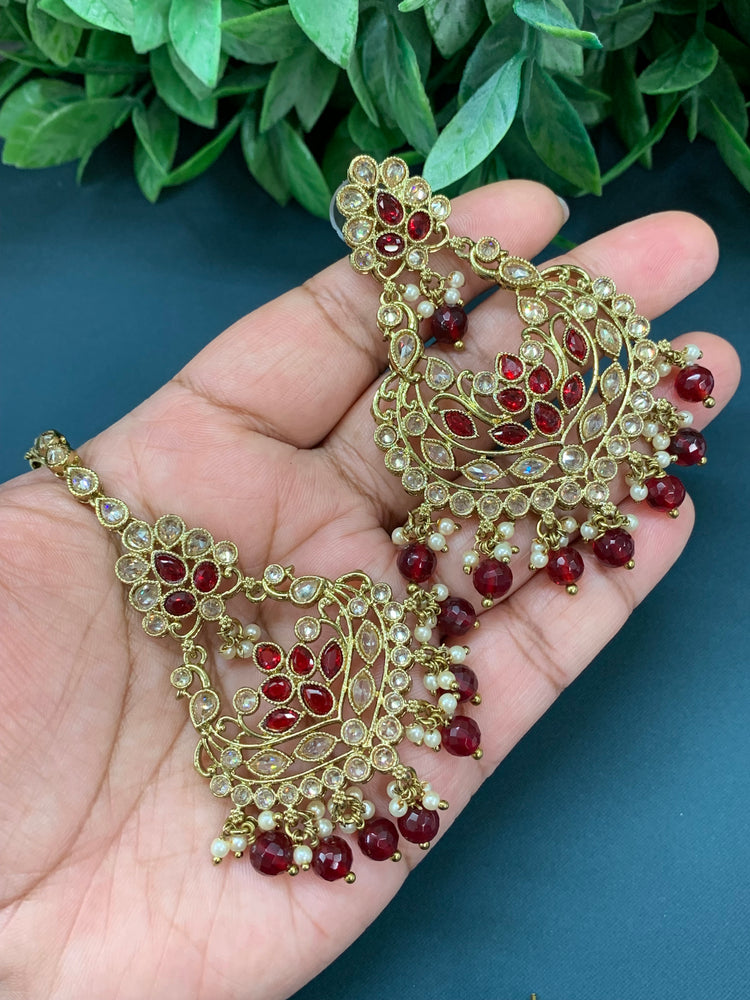 Raina reverse polki earring tikka set with pearl and maroon glass drop