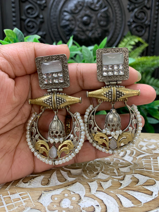 Taha dual tone chandbali style German silver earring grayish white