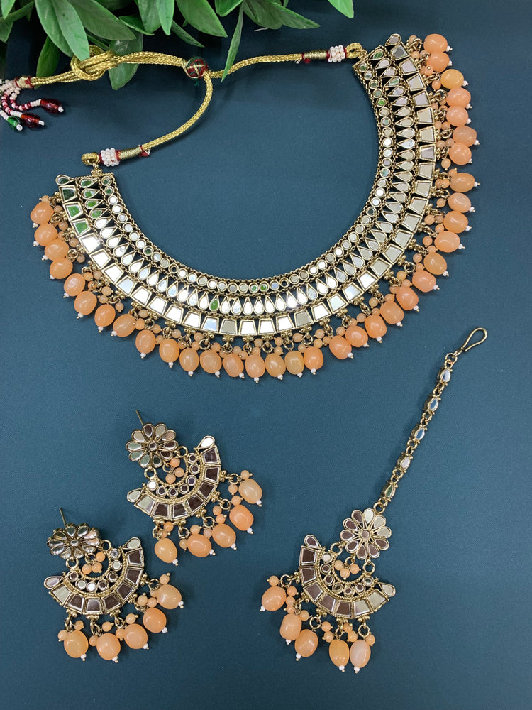 Shreya mirror necklace set with matching Chandbali antique peach