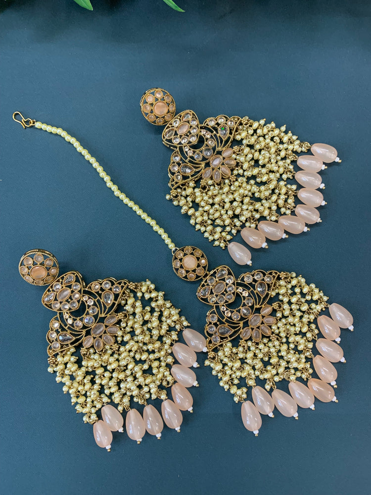 Cara statement polki earring tikka set pearl details and nude peach