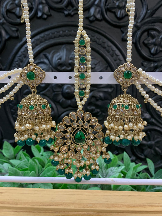 Shana triple layer bahubali sahare jhumki ear chain and matching tikka antique gold /emerald green