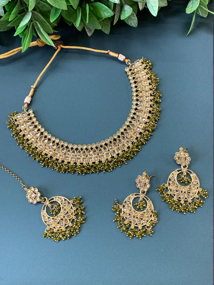 Rashmeet polki necklace with matching earring tikka antique gold mahendi/olive green