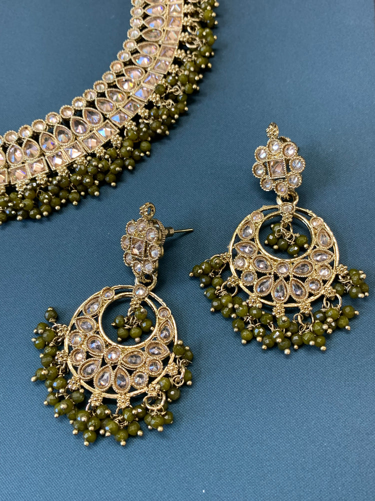 Rashmeet polki necklace with matching earring tikka antique gold mahendi/olive green