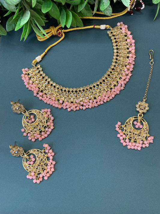 Rashmeet polki necklace with matching earring tikka antique gold pink