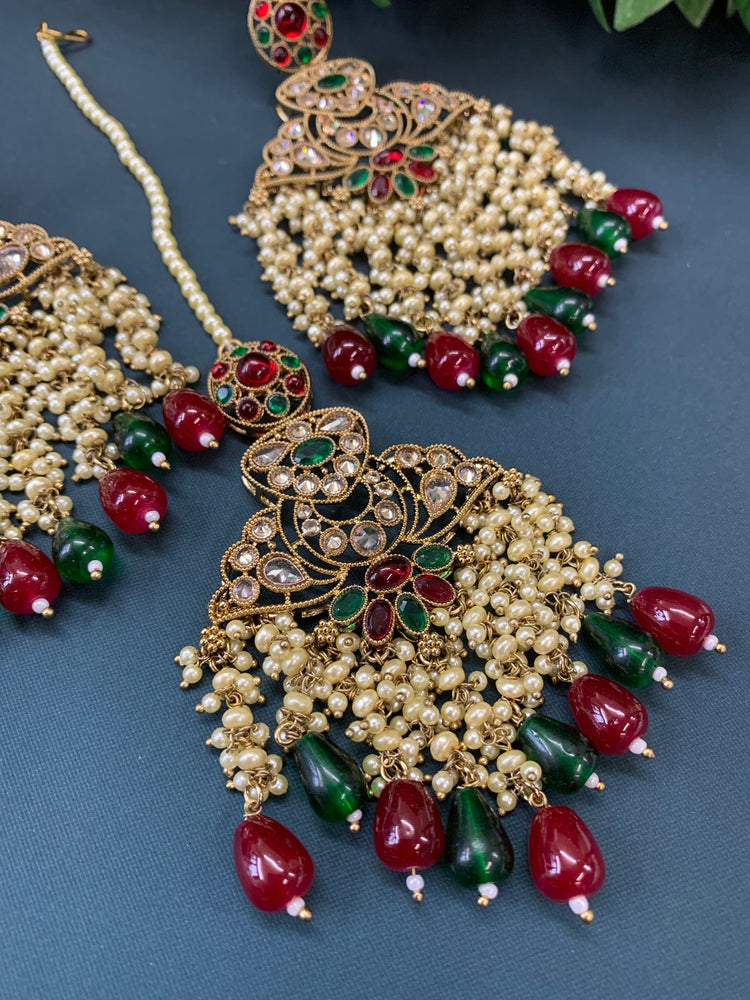 Cara statement polki earring tikka set pearl details and red green multi