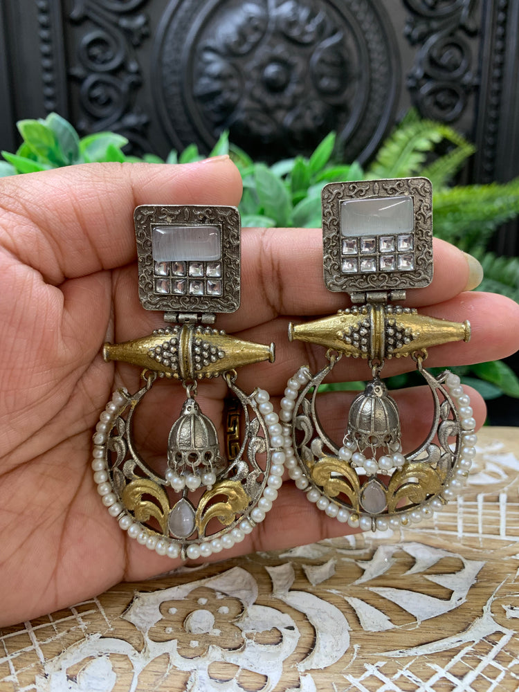 Taha dual tone chandbali style German silver earring grayish white