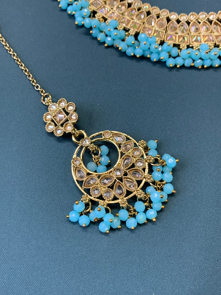 Rashmeet polki necklace with matching earring tikka antique gold baby blue