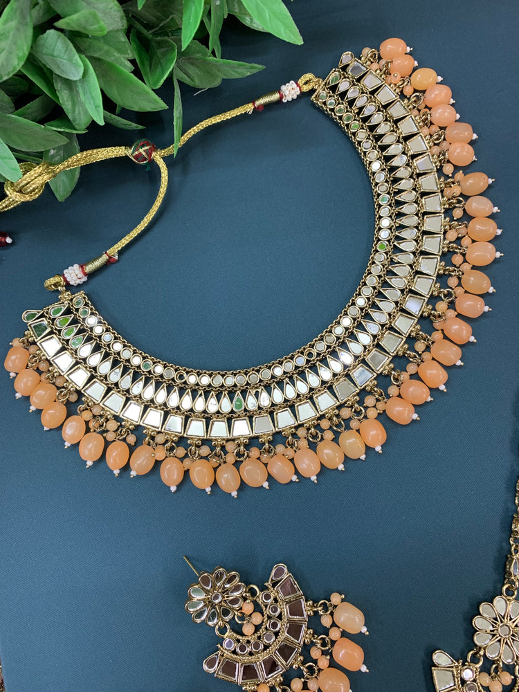 Shreya mirror necklace set with matching Chandbali antique peach