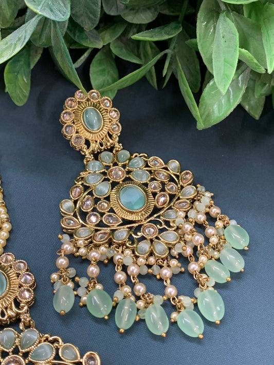 Ravi reverse polki earring tikka set with pearl and pistachio green glass drop