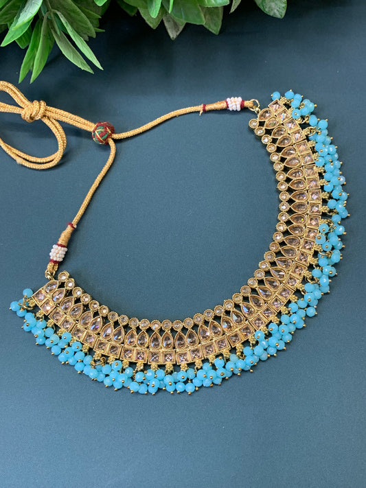 Rashmeet polki necklace with matching earring tikka antique gold baby blue