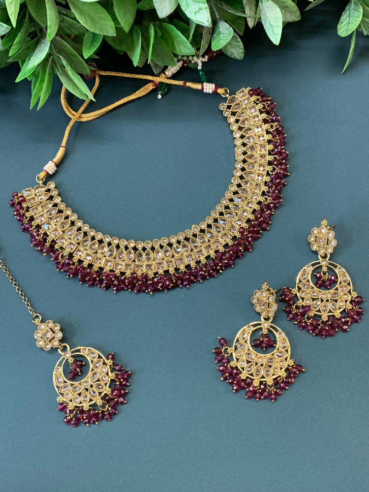 Rashmeet polki necklace with matching earring tikka antique gold wine red