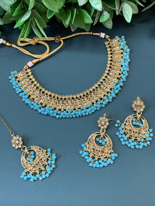 Rashmeet polki necklace with matching earring tikka antique gold baby blue