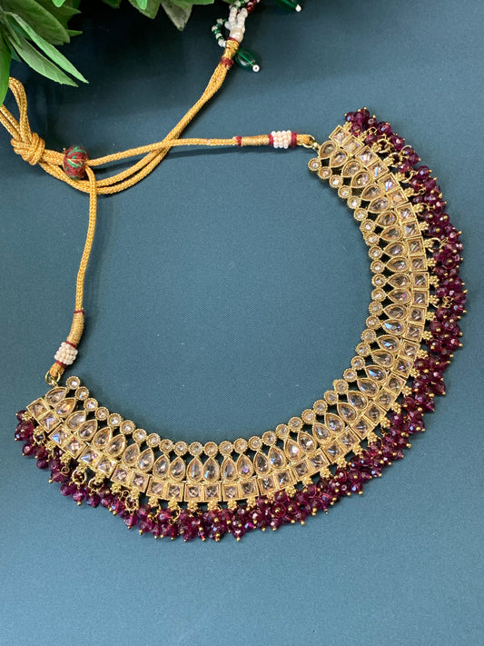 Rashmeet polki necklace with matching earring tikka antique gold wine red