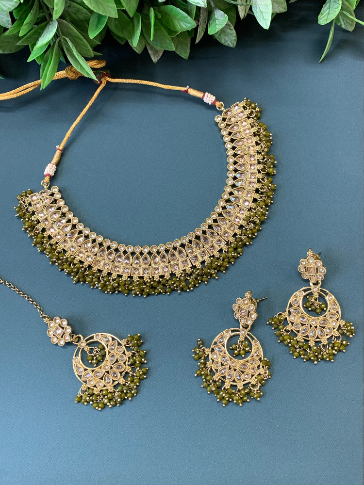 Rashmeet polki necklace with matching earring tikka antique gold mahendi/olive green