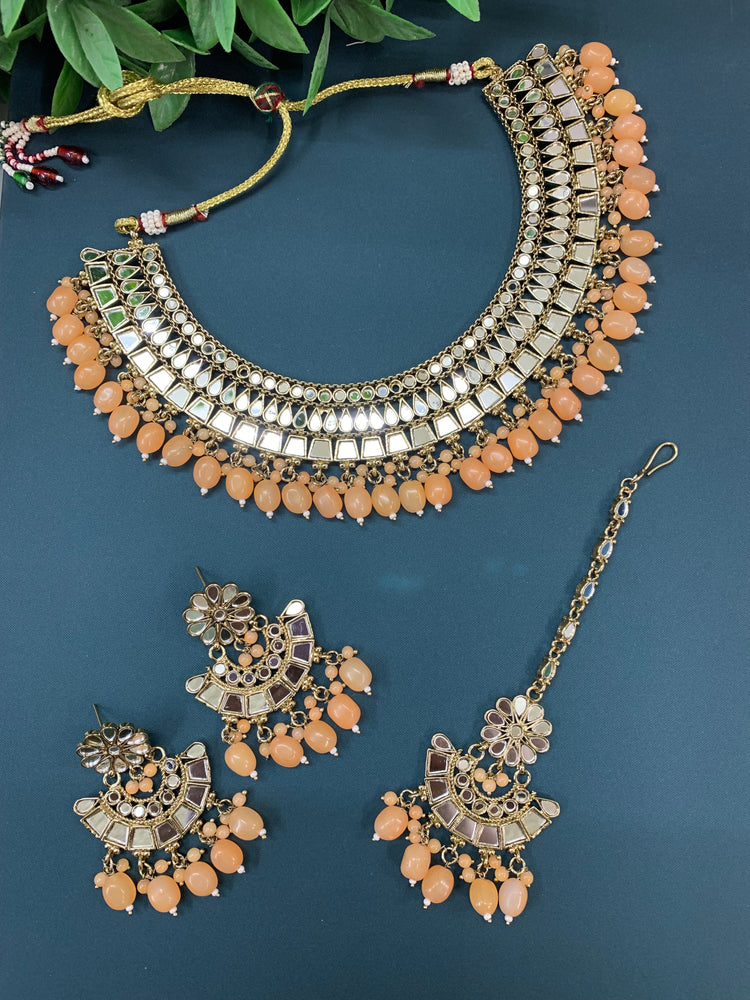 Shreya mirror necklace set with matching Chandbali antique peach