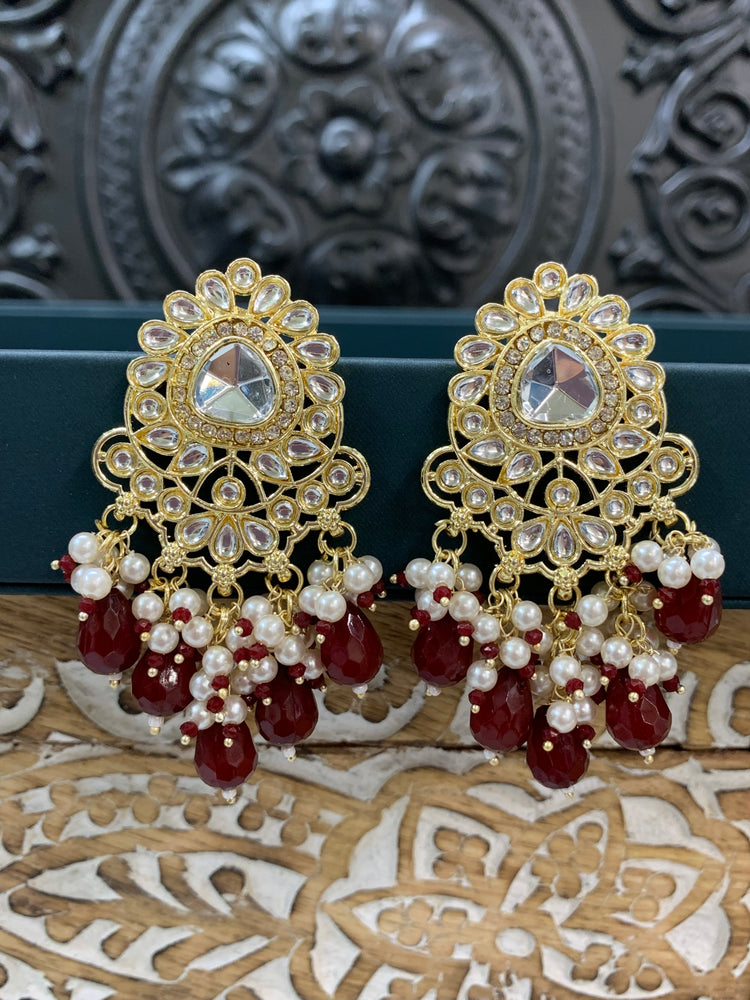 Joel gold kundan stud earring with white pearl and red maroon burgundy crystal