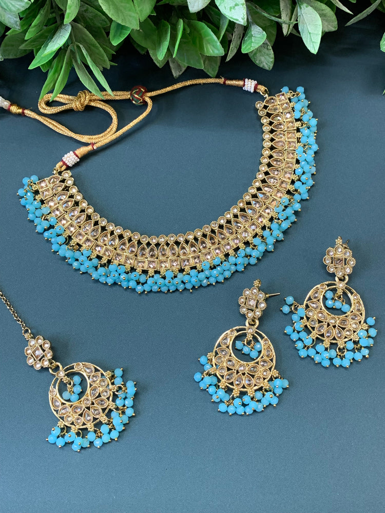 Rashmeet polki necklace with matching earring tikka antique gold baby blue