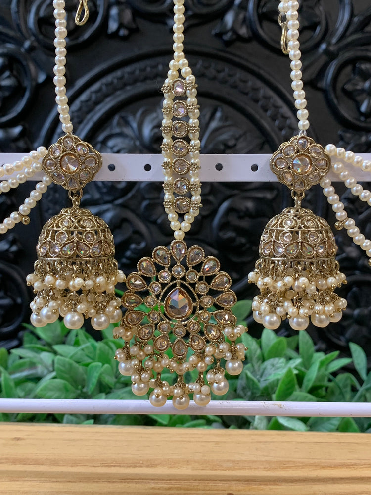 Shana triple layer bahubali sahare jhumki ear chain and matching tikka antique gold / pearl