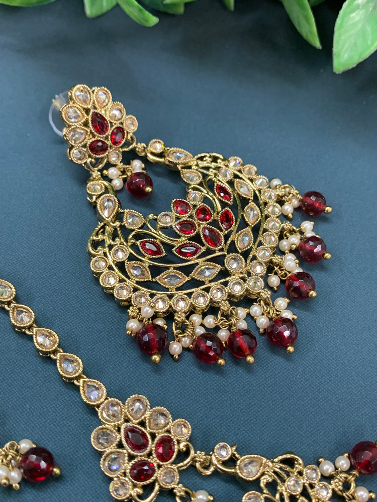 Raina reverse polki earring tikka set with pearl and maroon glass drop